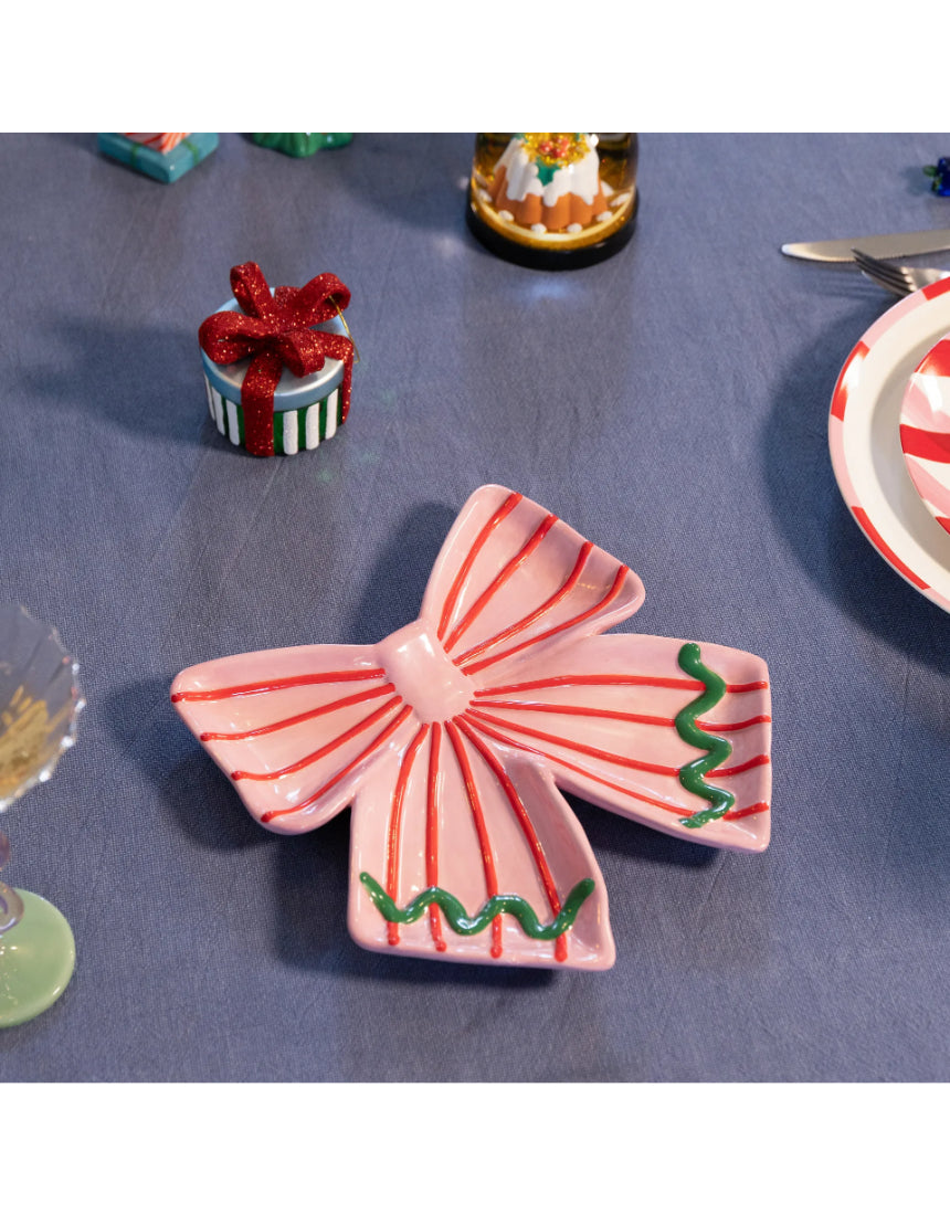 Klevering Plate Ribbon Pink jewelry piece with a pink ribbon design, showcasing the elegant, detailed craftsmanship.