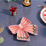 Klevering Plate Ribbon Pink jewelry piece with a pink ribbon design, showcasing the elegant, detailed craftsmanship.