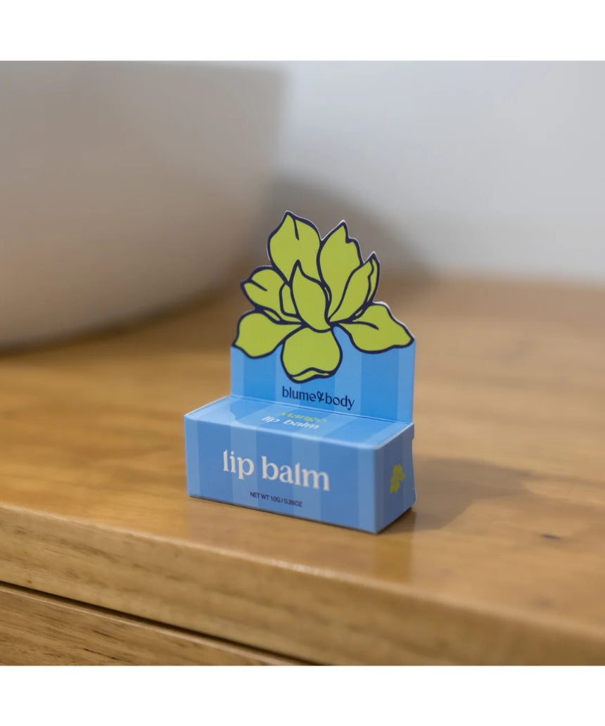 Bloom & Body Mango Lip Balm tube with bright packaging, showcasing smooth, nourishing mango-flavored lip balm.