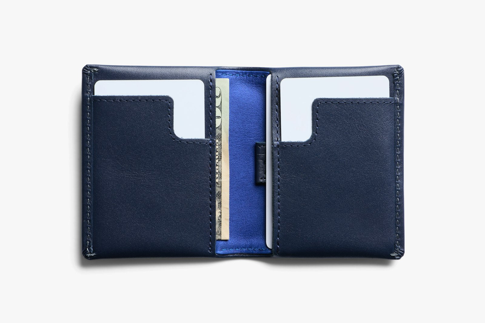 Bellroy Slim Sleeve wallet in navy showing sleek leather design with card slots and minimalistic style.