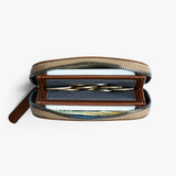 Bellroy Folio Mini wallet in Hazelnut, featuring a slim leather design with card slots and a central cash compartment.