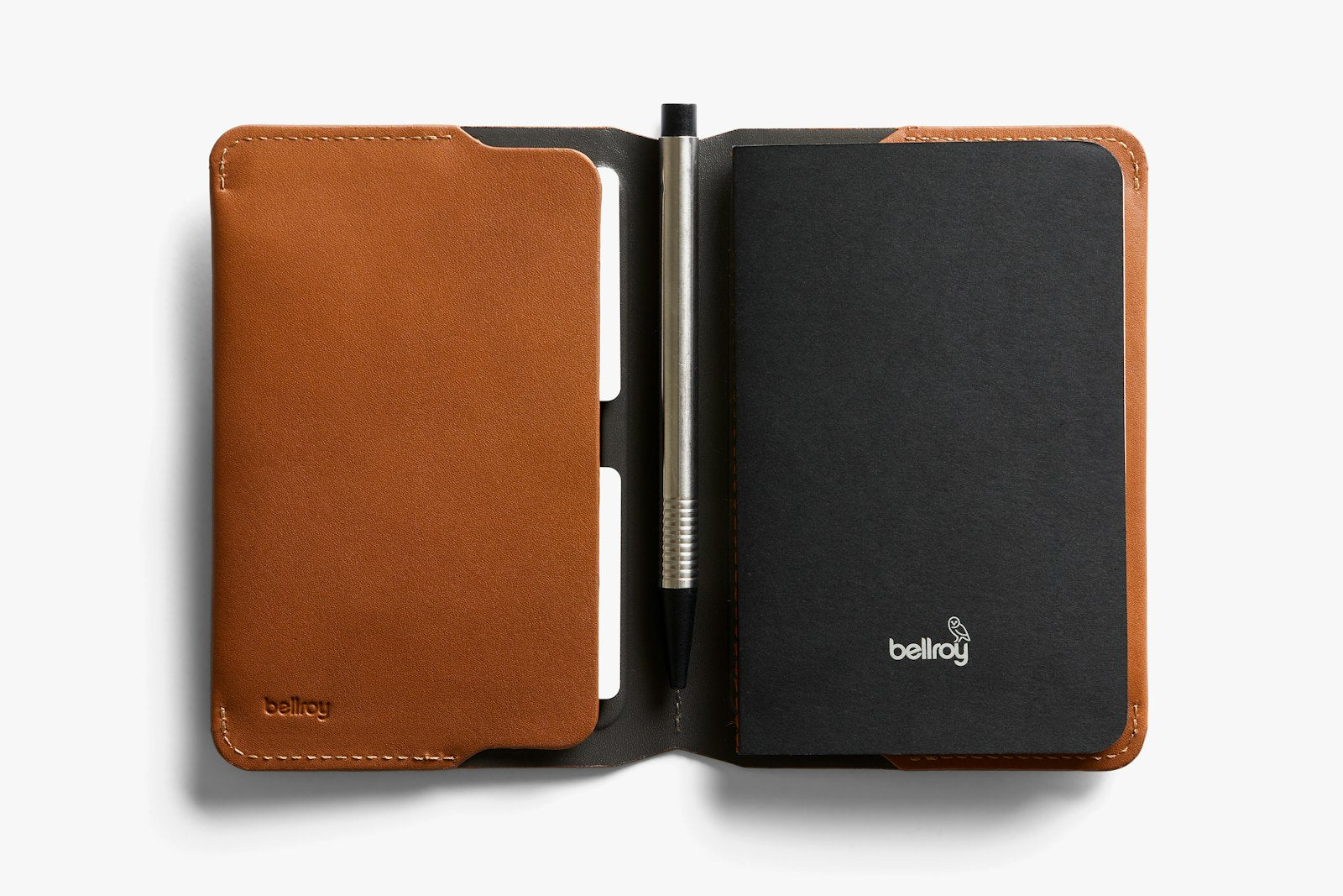 Bellroy caramel leather notebook cover showing smooth texture and sleek design, with visible stitching and a compact shape.