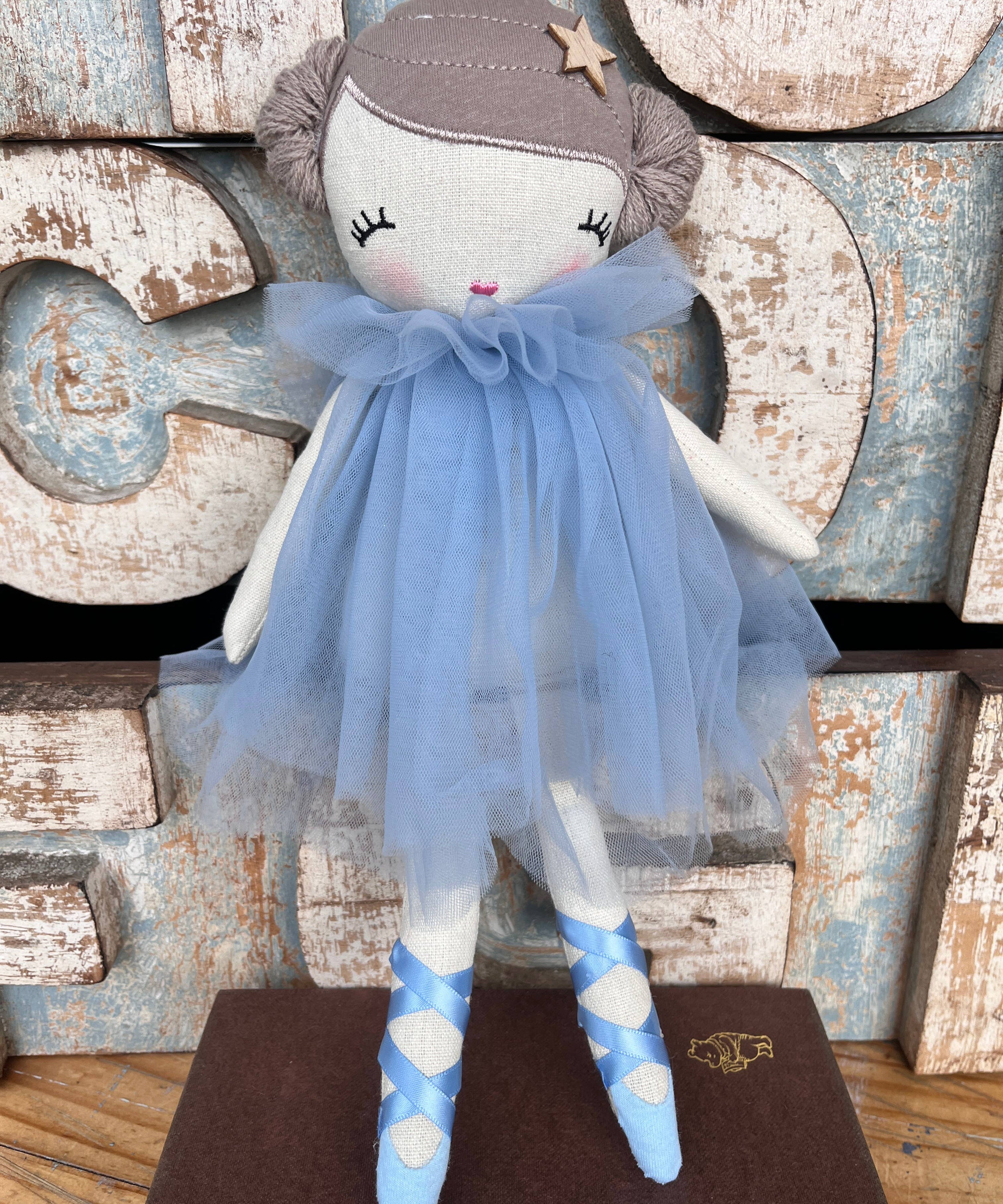 Amaranta Designs ballerina doll with a pink tutu, ballet shoes, and detailed facial features, dressed in a graceful ballet pose.