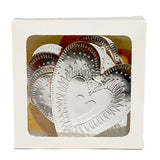 Faux-tin heart bunting by THE LITTLE PRESS in light dusty pink, reversible decorative hanging for nursery or party decor.