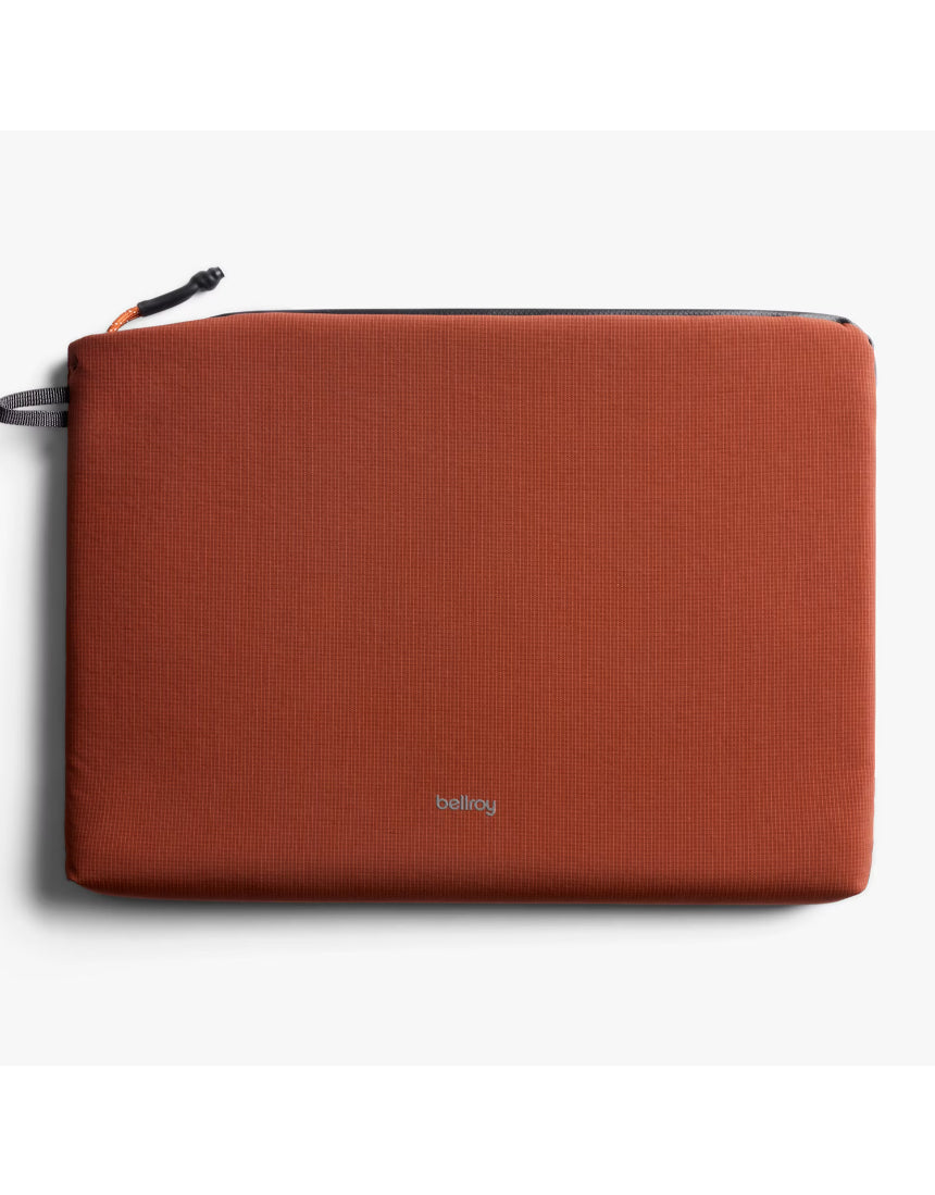 Bellroy Lite 14-inch Clay laptop sleeve showing a slim, protective case with smooth fabric exterior and subtle branding.