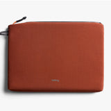 Bellroy Lite 14-inch Clay laptop sleeve showing a slim, protective case with smooth fabric exterior and subtle branding.