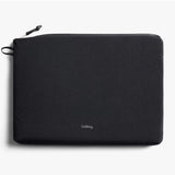 Black Bellroy Lite Laptop Sleeve for 16-inch laptops, slim design with smooth exterior and padded interior for protection.