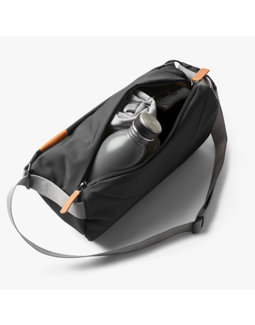 Bellroy Sling Bag in slate color, compact and stylish with adjustable strap, ideal for everyday carrying and organization.