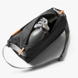 Bellroy Sling Bag in slate color, compact and stylish with adjustable strap, ideal for everyday carrying and organization.