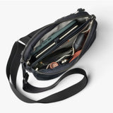 Bellroy Tokyo Side Bag crossbody bag in navy color, showing its sleek design and adjustable strap.