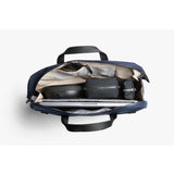 Bellroy Via Work Bag in navy, sleek leather briefcase with handles, front pocket, and adjustable shoulder strap for professional use.
