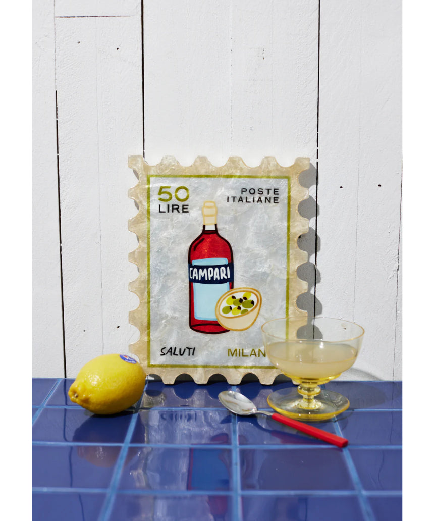 Jones & Co Campari Stamp wall decor featuring vintage-style red and white graphic design on a framed art piece.