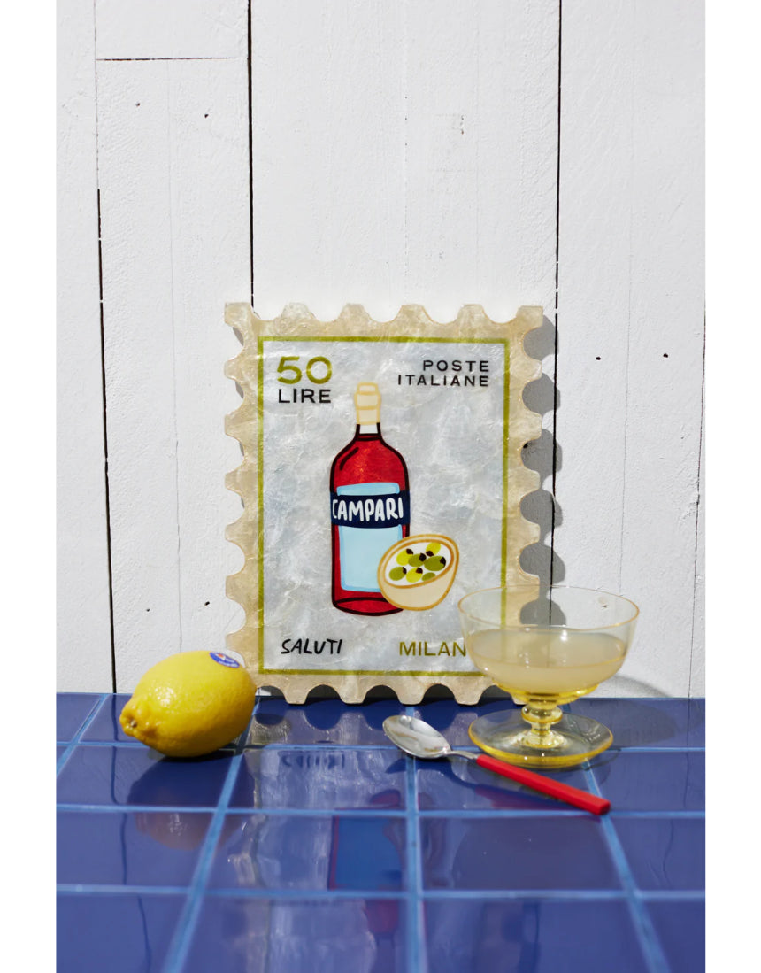 Jones & Co Campari Stamp wall decor featuring vintage-style red and white graphic design on a framed art piece.