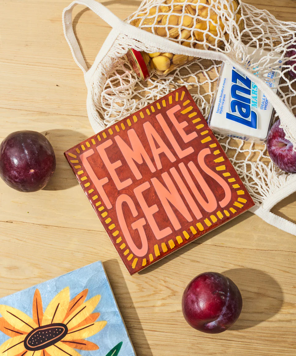 Jones & Co Superette Genius Tile wall decor featuring colorful geometric patterns on ceramic surface.