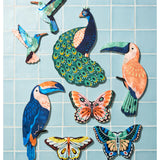 Jones & Co Canopy Peacock Wall Art, decorative wall decor featuring vibrant peacock design and intricate details.