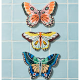 Jones & Co yellow butterfly wall art, styled decor piece featuring a vibrant butterfly design for wall decoration.