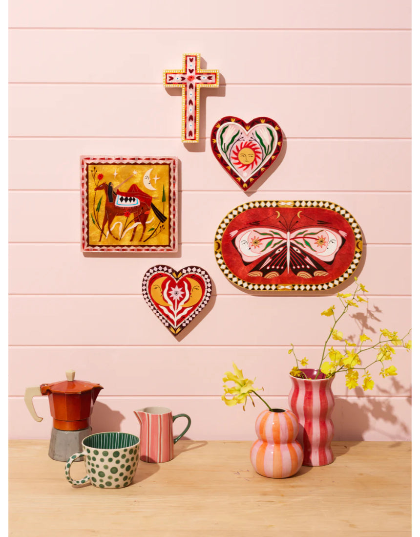 Jones & Co Fable Butterfly Pink Oval wall decor featuring a delicate pink butterfly design on an oval background.