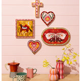 Jones & Co Fable Butterfly Pink Oval wall decor featuring a delicate pink butterfly design on an oval background.