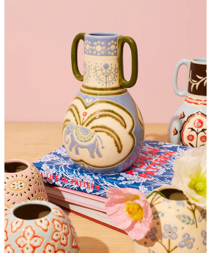 Jones & Co Samira Elephant Vase, decorative ceramic vase with elephant design, showcasing intricate details and a smooth finish.