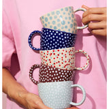Jones & Co Chino Mug in Mahogany Sprinkle with a stylish ceramic mug design and a glossy finish.