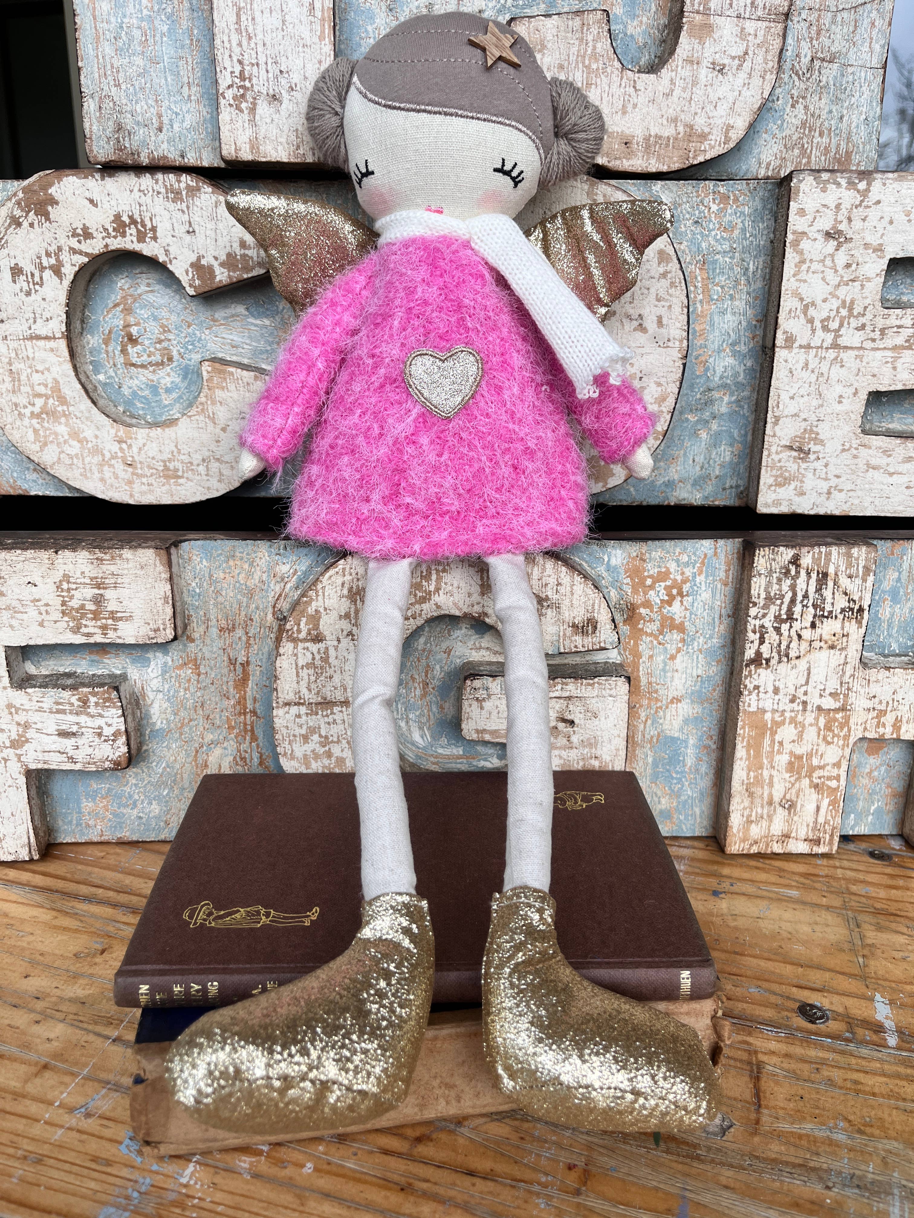 Amaranta Designs Bubblegum Doll with pink hair, colorful outfit, and playful expression, showcasing detailed craftsmanship.