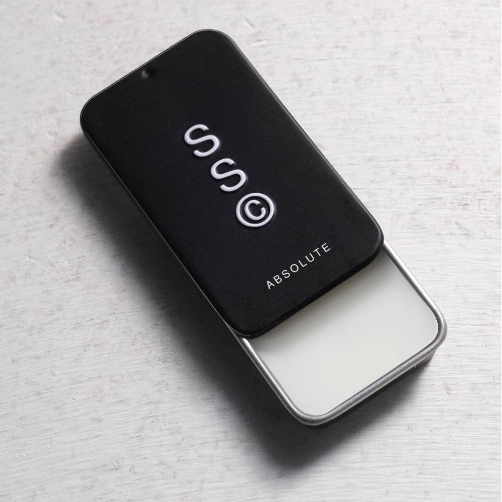 Solid State Absolute Solid Cologne jar with sleek packaging and minimalist design, showcasing the premium cologne product.
