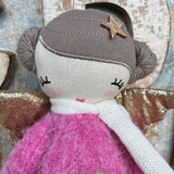 Amaranta Designs Bubblegum Doll with pink hair and colorful outfit, displayed on a neutral background.