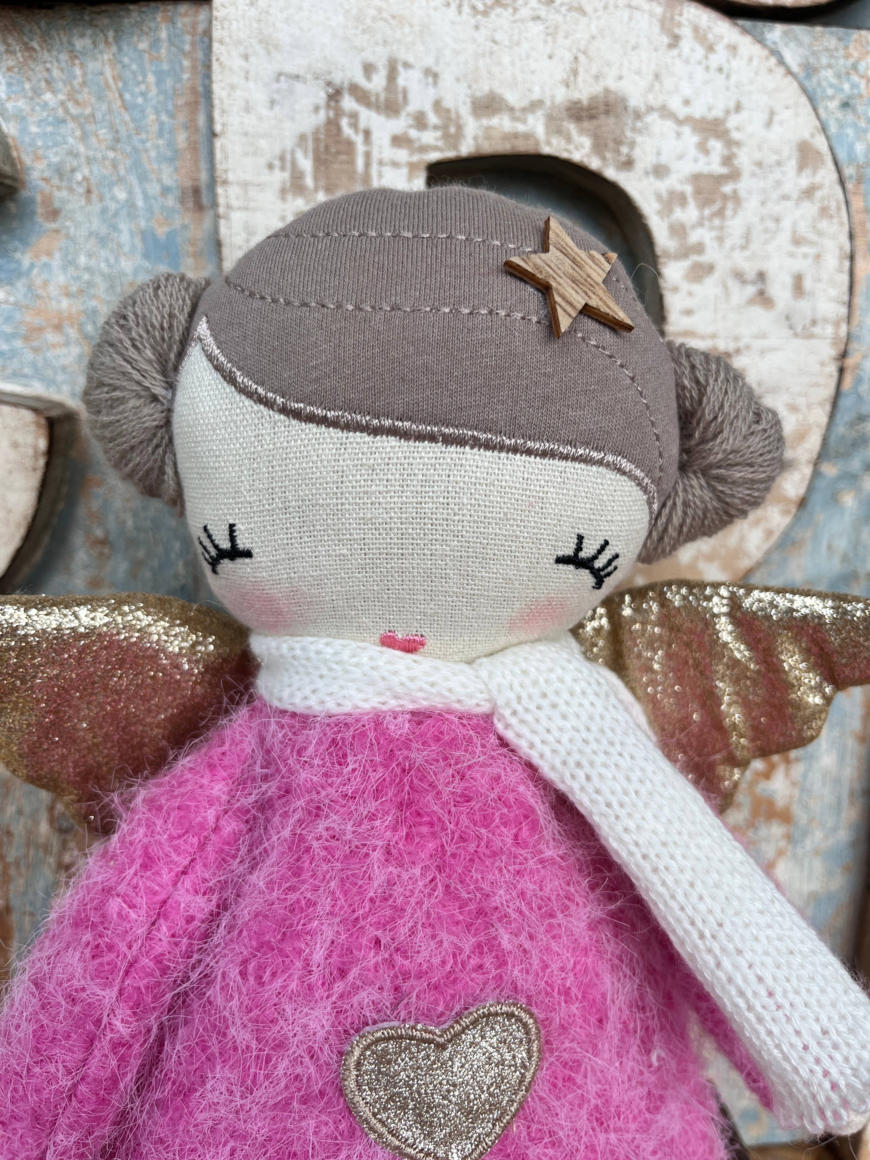 Amaranta Designs Bubblegum Doll with pink hair and colorful outfit, displayed on a neutral background.