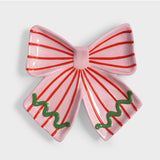 Klevering Plate Ribbon Pink jewelry piece featuring a pink ribbon design on a round plate-shaped accessory.
