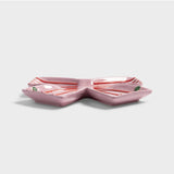 Klevering Plate Ribbon Pink jewelry piece with pink ribbon design, showcasing a stylish and elegant accessory.