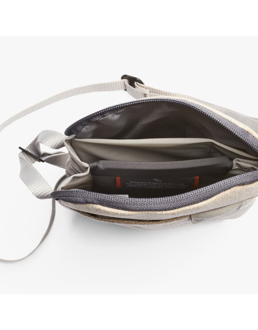 Bellroy City Pouch in Saltbush fabric showing compact bag with multiple compartments and zipper closures, designed for organization.