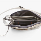 Bellroy City Pouch in Saltbush fabric showing compact bag with multiple compartments and zipper closures, designed for organization.