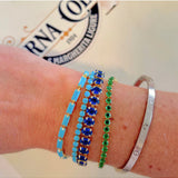Salty Safari Mila tennis bracelet featuring sparkling beads and a sleek silver clasp, stylish jewelry accessory for women