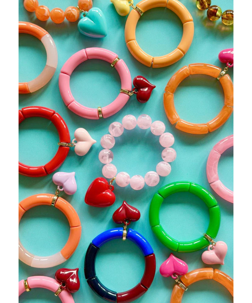Mosk Melbourne Big Heart bracelet featuring a silver band and a prominent heart charm on a white background.