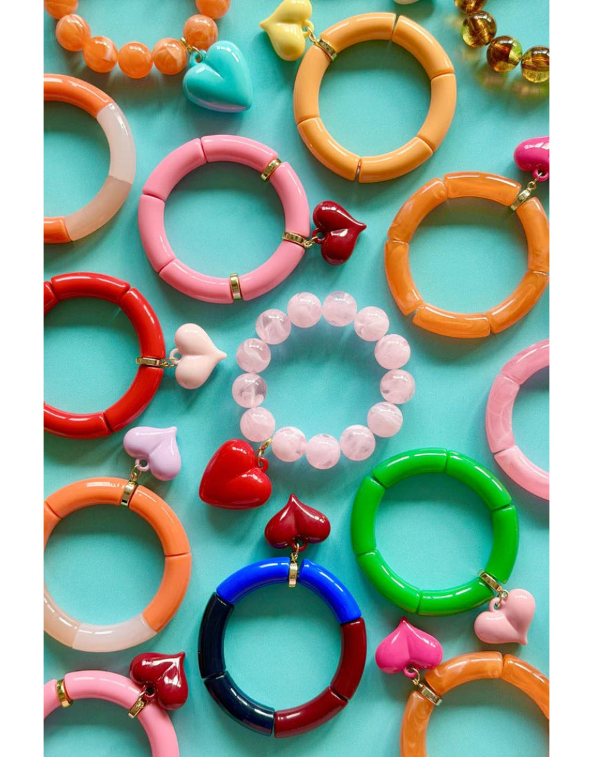Mosk Melbourne Big Heart bracelet featuring a silver band and a prominent heart charm on a white background.