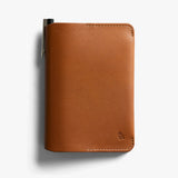 Bellroy caramel notebook cover with sleek leather design, featuring a slim, compact silhouette and visible stitching.