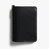 Bellroy black notebook cover with sleek leather design and minimalist stitching, perfect for organizing notebooks.