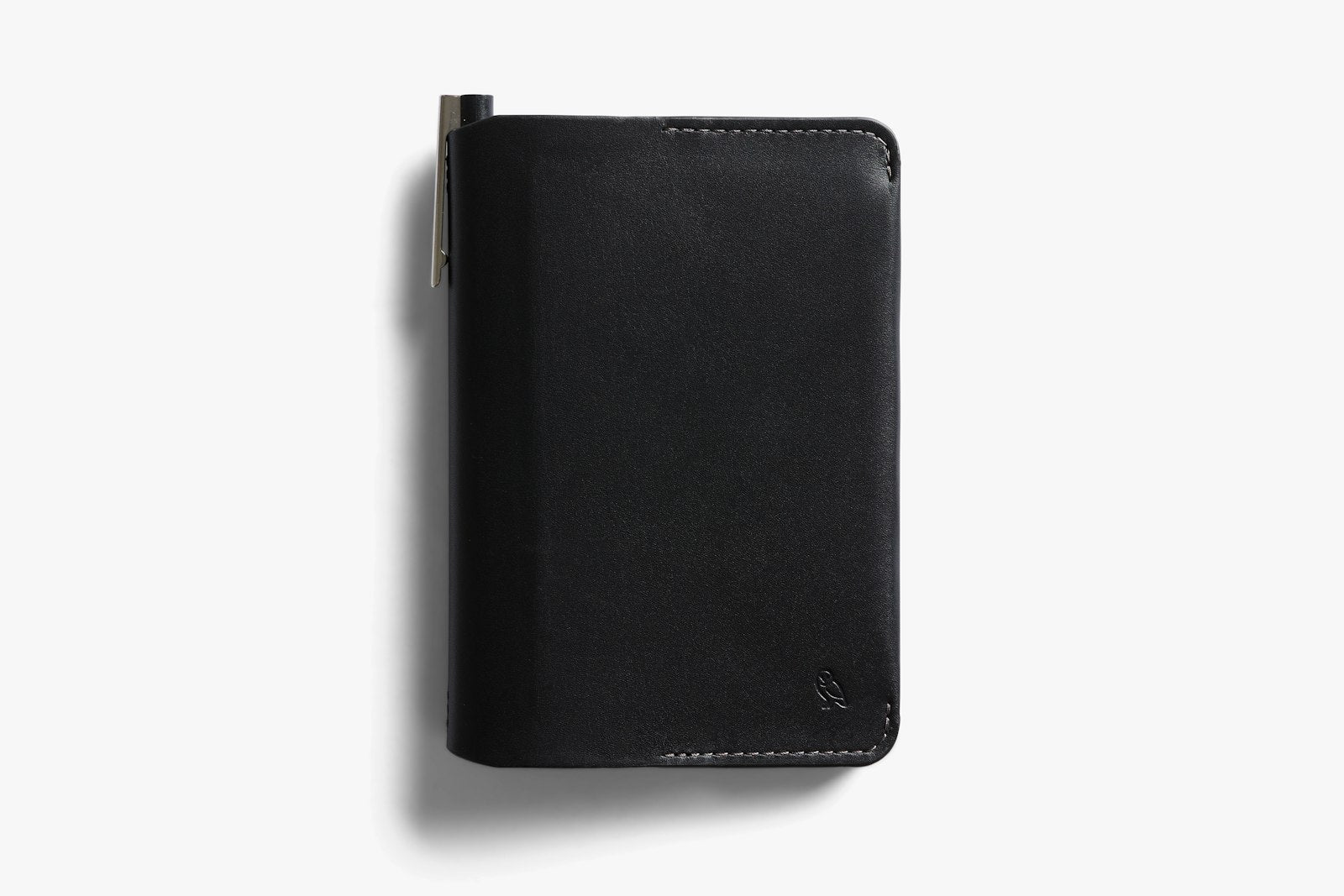 Bellroy black notebook cover with sleek leather design and minimalist stitching, perfect for organizing notebooks.