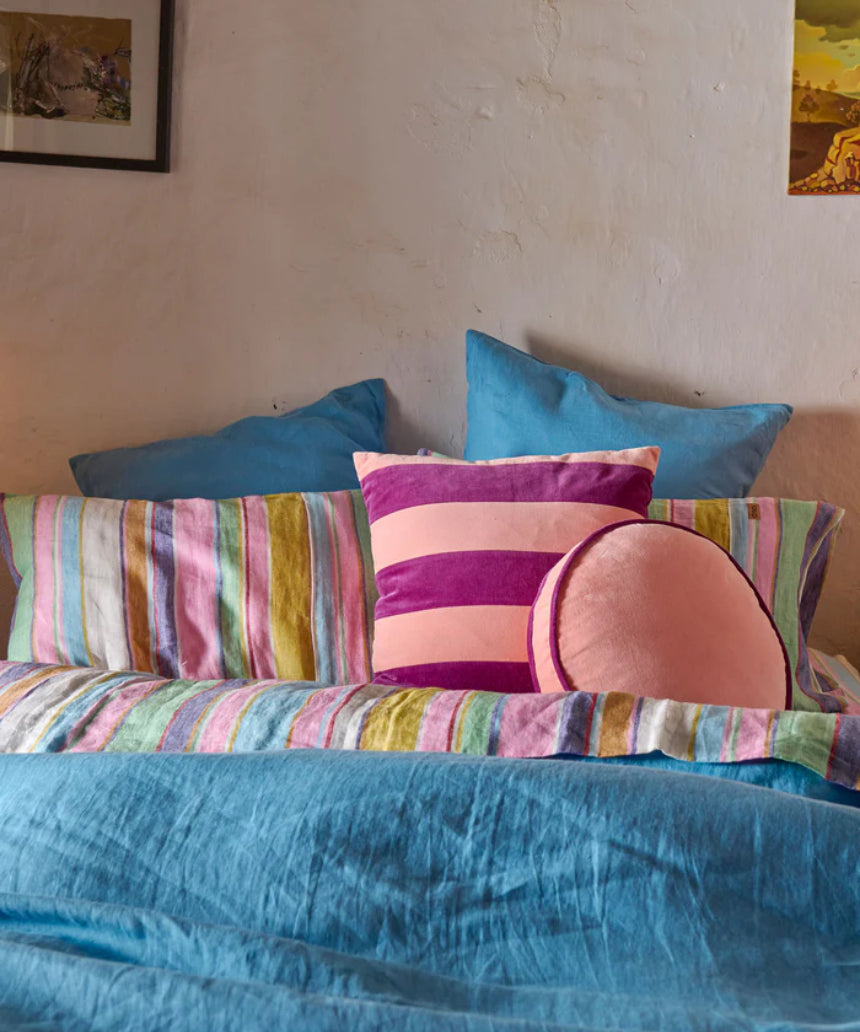 Kip & Co plum jam velvet cushion with soft, plush fabric and decorative stitching, perfect for cozy home decor.