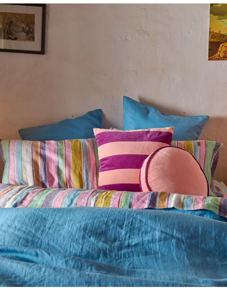 Kip & Co plum jam velvet cushion with soft, plush fabric and decorative stitching, perfect for cozy home decor.