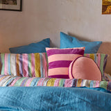 Kip & Co plum jam velvet cushion with soft, plush fabric and decorative stitching, perfect for cozy home decor.
