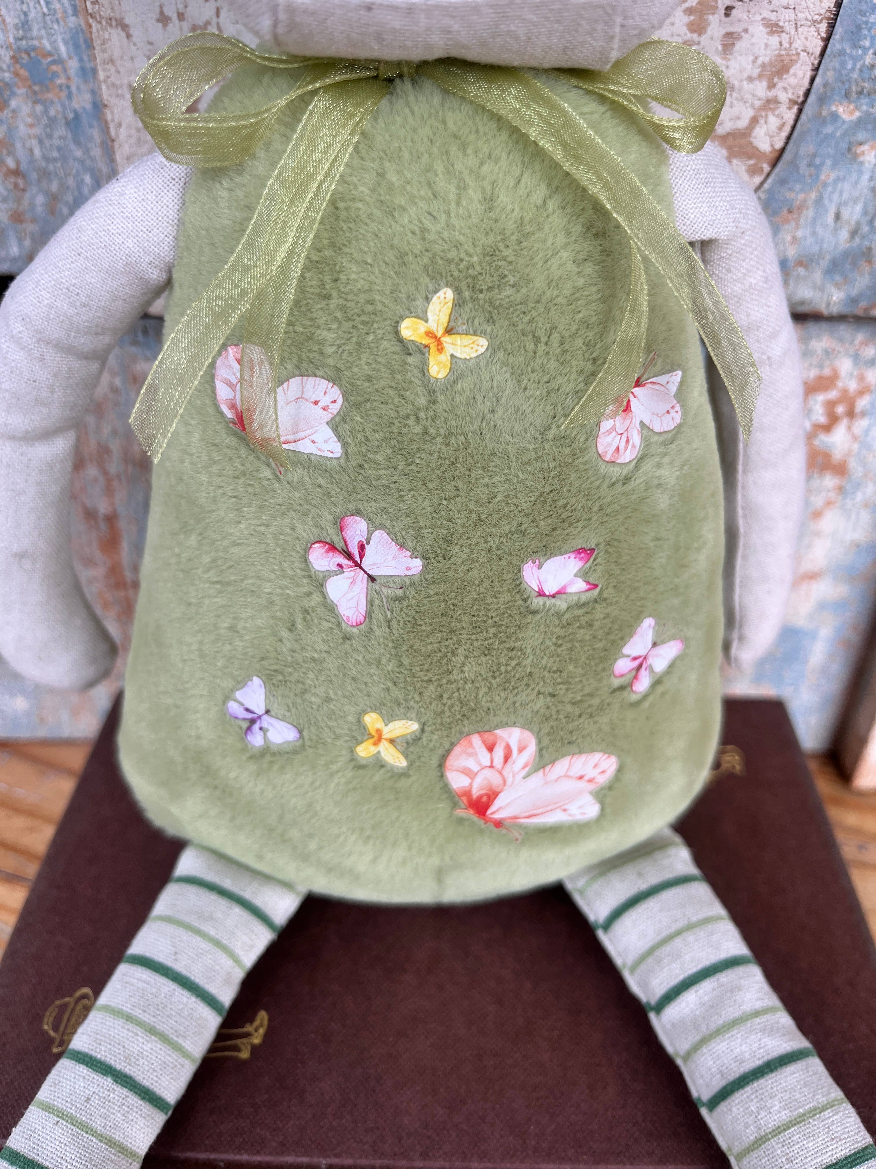 Amaranta Designs Daisy Lamb plush toy with soft fabric and detailed floral embroidery, ideal for children and collectors.