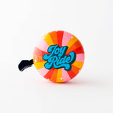 Pink Beep Joy Ride bike and scooter bell showing a colorful, playful design with a round bell shape and a mounting strap.