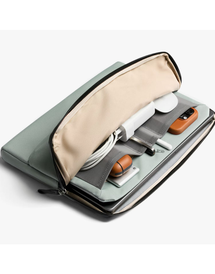 Bellroy 14-inch Laptop Caddy in Eucalyptus, showing a sleek, organized leather accessory with multiple compartments for tech essentials.