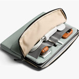 Bellroy 14-inch Laptop Caddy in Eucalyptus, showing a sleek, organized leather accessory with multiple compartments for tech essentials.