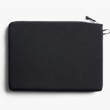 Black Bellroy Lite 16-inch laptop sleeve with sleek design and padded interior for safe, stylish device protection.