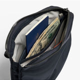 Bellroy Tokyo Side Bag in navy, a stylish crossbody bag with multiple compartments and adjustable strap, designed for everyday use.