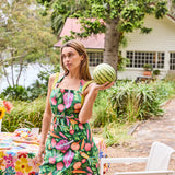 Kip & Co veggie soup apron with colorful vegetable print, adjustable neck strap, and tie waist, designed for cooking and kitchen protection.