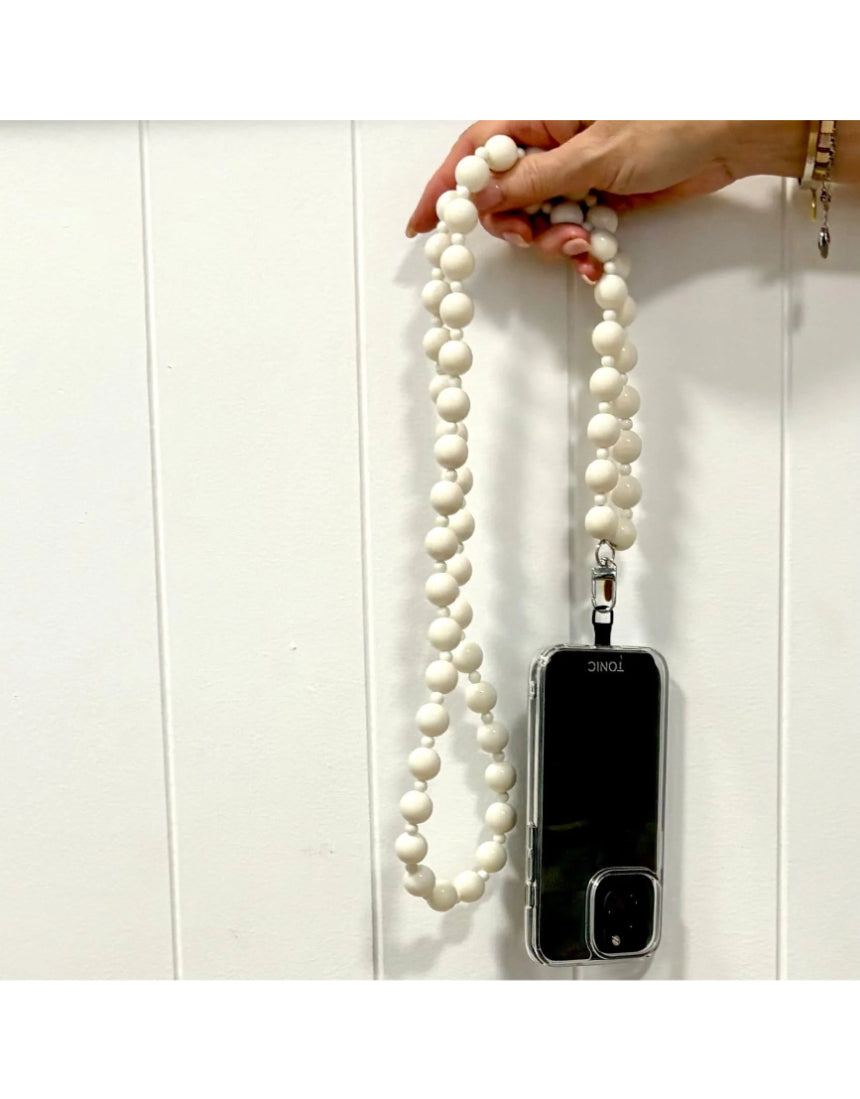 Salty Safari Bella Cross Body Phone Holder accessory with adjustable strap and compact design, ideal for carrying smartphones and essentials.