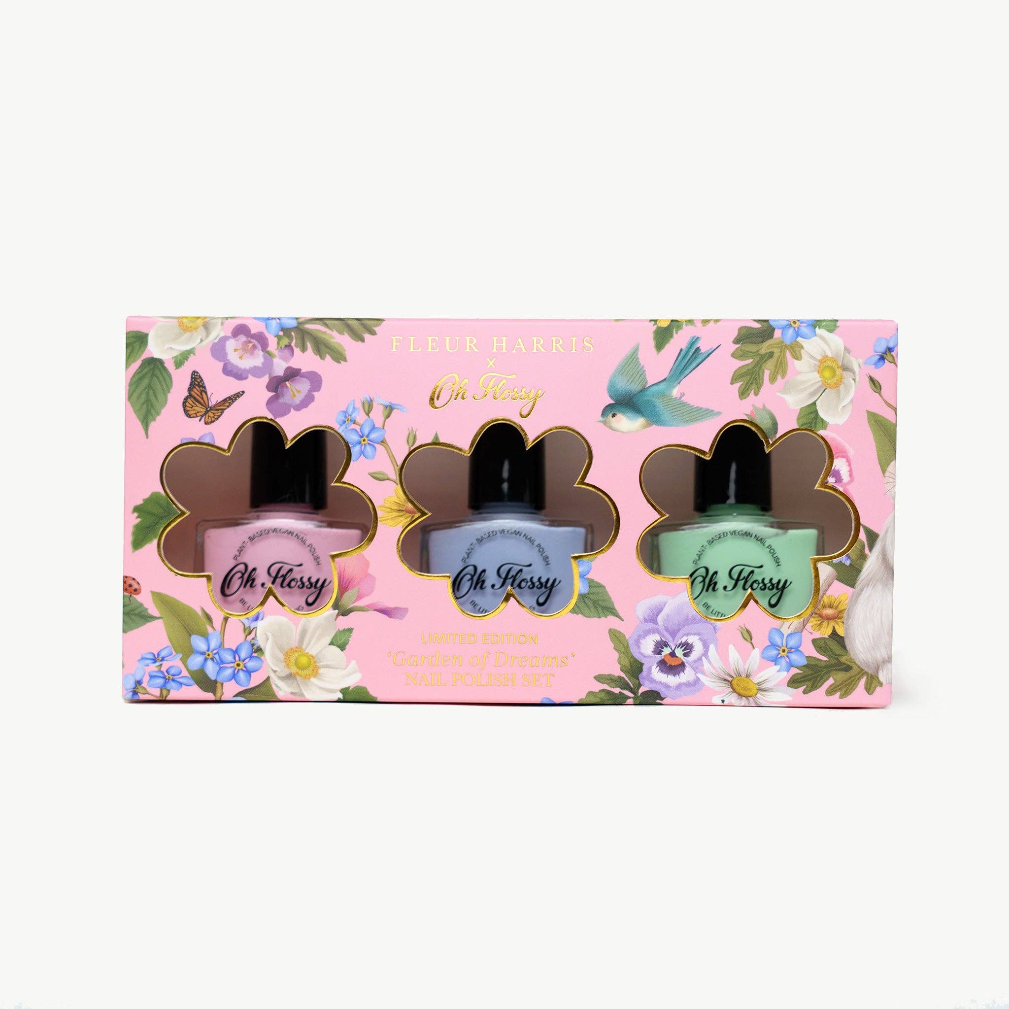Oh Flossy Garden of Dreams nail polish set featuring vibrant shades from the Fleur Harris collection, displayed with close-up of bottles
